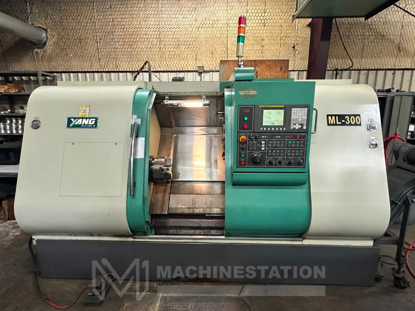 Used YANG ML-300 CNC Turning Center front view with door open – SKU 50137