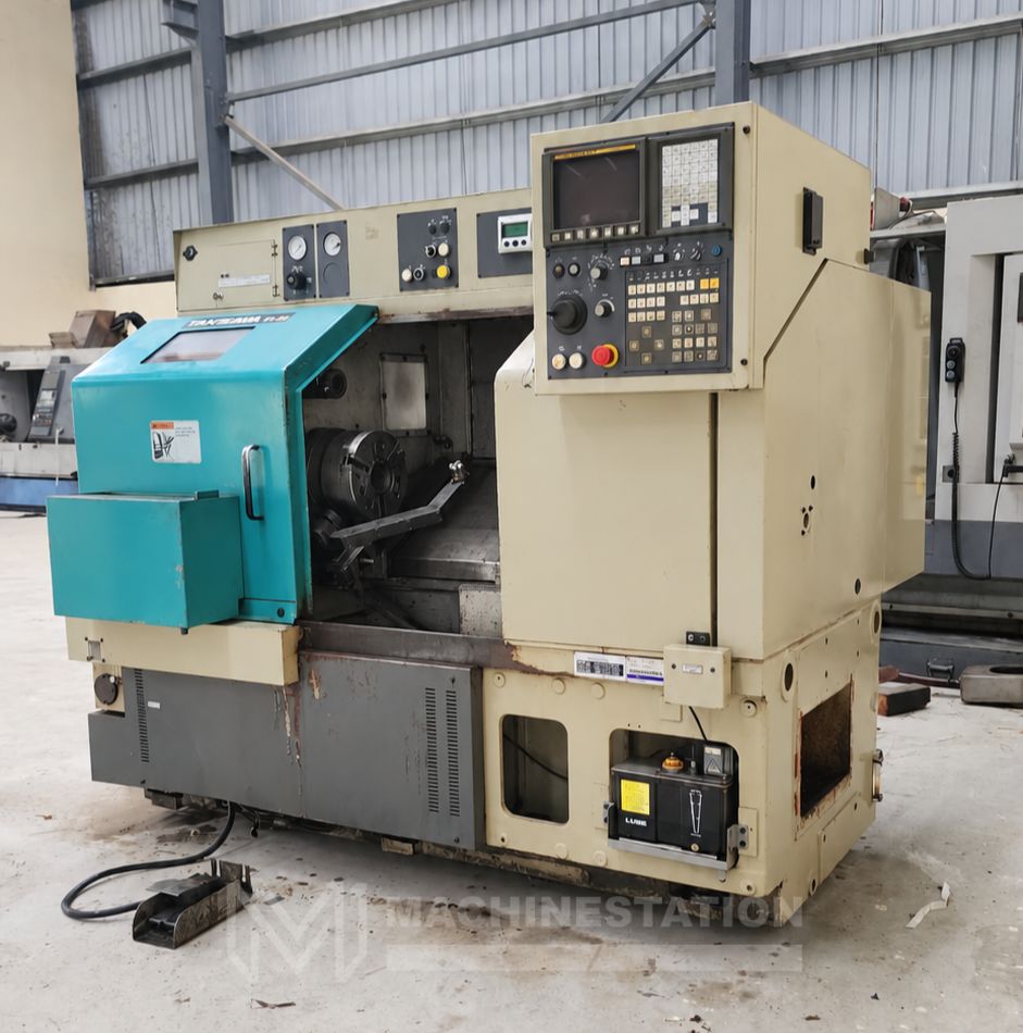 Used Takisawa TC-30 CNC Turning Center front angle view – SKU 50122